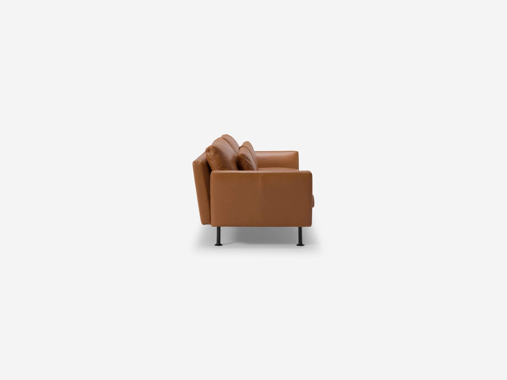 Modern brown leather sofa side view